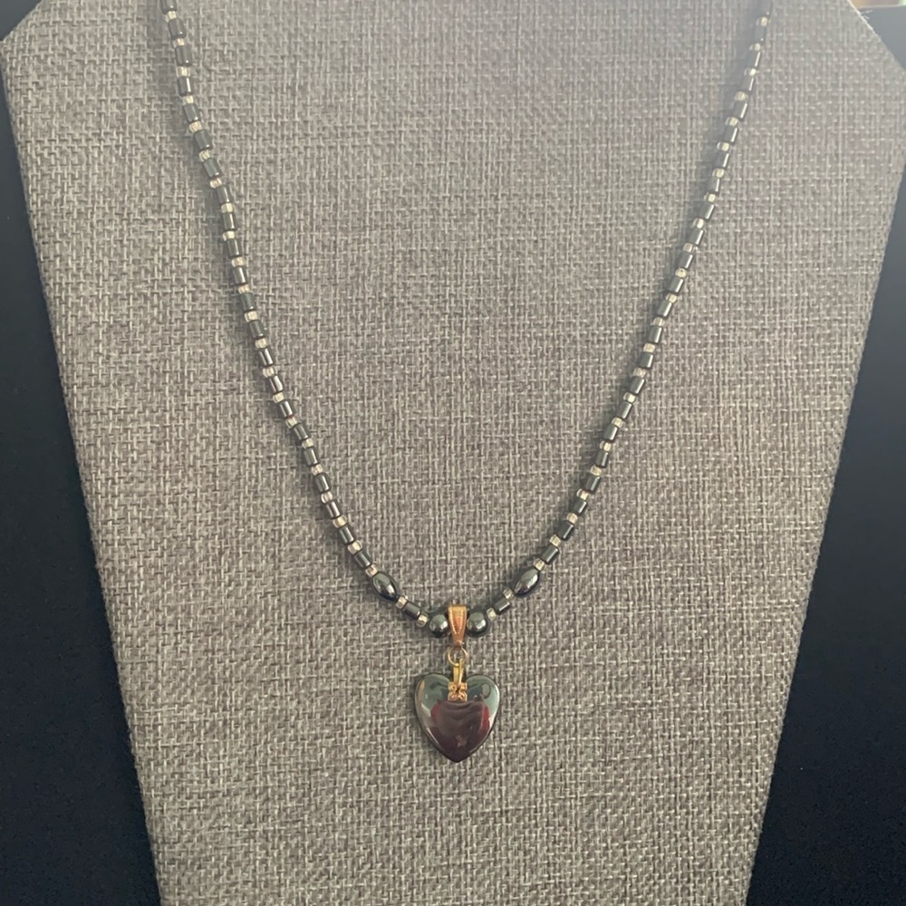 Gold Tone Hematite Beaded Necklace with a Heart Pendant 18”